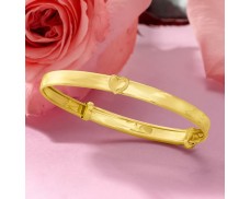 Child's 14kt Yellow Gold Heart Bangle Bracelet. 5"